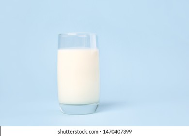 Glass Of Fresh Milk On Color Background