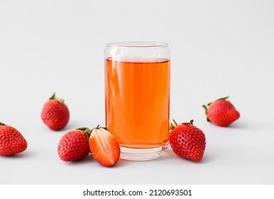 Glass Of Fresh Strawberry Kombucha On Light Background, Closeup