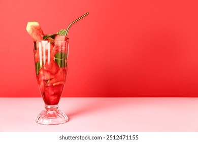 Glass of fresh watermelon lemonade with mint on pink table - Powered by Shutterstock