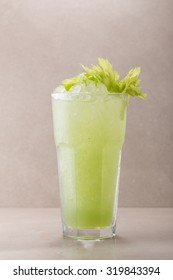 Glass Of Frozen Green Lemonade With Mint Isolated On Grey Background