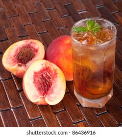 Glass of fruity ice tea perfect for hot summer