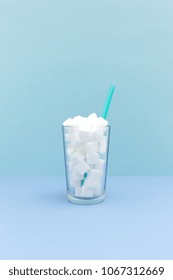 Glass Full Of Sugar Cubes - Image Concept For Additive Hidden Sugar In Beverages