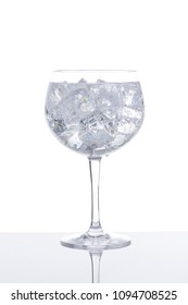 Glass Of Gin And Tonic On White Background