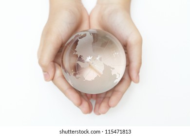 Glass Globe In Hand.