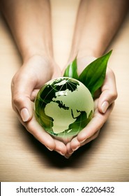 Glass Globe In Hand