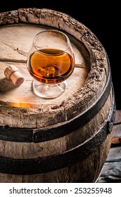 Glass Of Good Cognac In The Distillery Basement