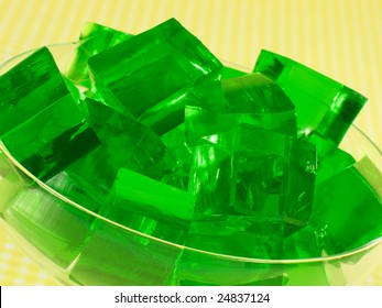 Glass Of Green Cubed Gelatin.