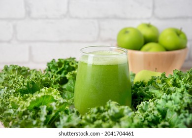 Glass Of Healthy  Kale Smoothie On Table. Green Detox Smoothie Or Blended Juice In Glass .