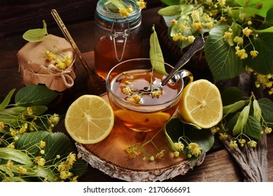 Glass of healthy linden tea with honey and lemon for cold and immunity