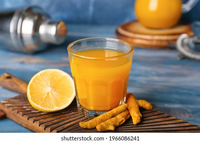 Glass Of Healthy Turmeric Drink On Table