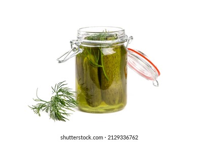 A Glass Home Canning Jar Of Baby Dill Pickles With The Lid Open Isolated On White