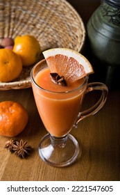 A Glass Of Hot Citrus Tea Made Of Grapefruit And Orange. Hot Autumn Drink