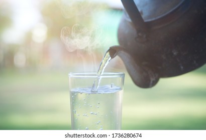 A glass of hot water from the old kettle. - Powered by Shutterstock