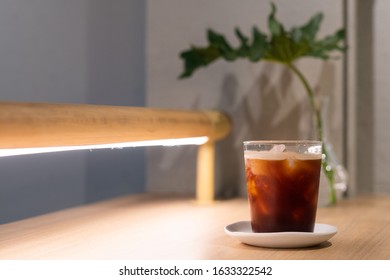 A Glass Of Ice Americano In Coffee Cafe 