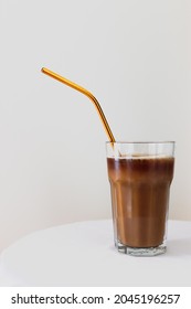 Glass With Ice Coffee And Metal Straw, White Background