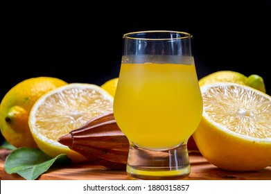 Glass Of Ice Cold Sweet Limoncello Liqueur Made From New Harvest Of Fresh Ripe Yellow Italian Lemons, Amalfi Coast, Italy