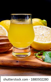 Glass Of Ice Cold Sweet Limoncello Liqueur Made From New Harvest Of Fresh Ripe Yellow Italian Lemons, Amalfi Coast, Italy