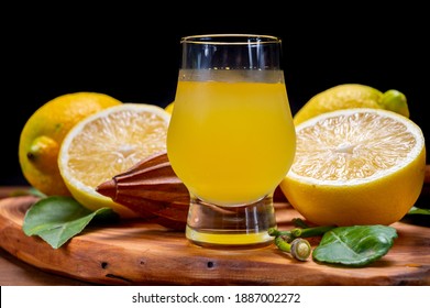 Glass Of Ice Cold Sweet Limoncello Liqueur Made From New Harvest Of Fresh Ripe Yellow Italian Lemons, Amalfi Coast, Italy