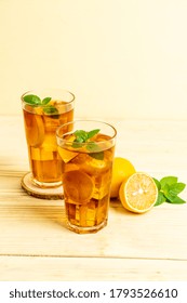 Glass Of Ice Lemon Tea With Mint