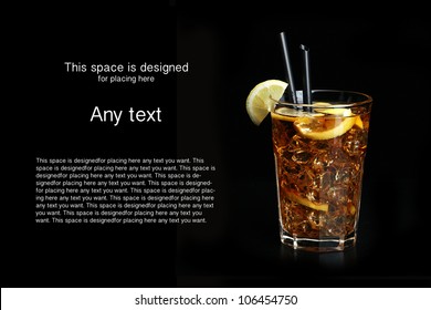 Glass Of Ice Tea With Lemon On Black Background