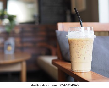 Glass of a iced coffee with cream milk. Cold brew coffee drink with ice. 