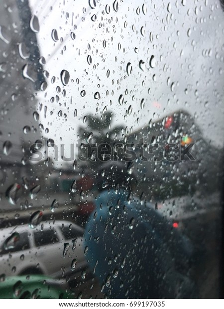 Glass island, rain, car\
stick