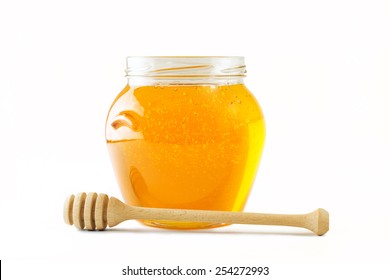 Glass Jar Full Of Honey Wooden Honey Dipper