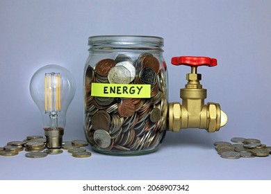 A Glass Jar Full Of Money Labelled Energy. The Increasing Costs Of Electricity And Gas Concept.