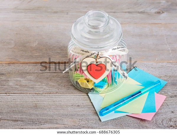 Glass Jar Handmade Wooden Hearts Decorations Stock Image