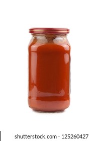 Glass Jar Of Hot Tomato Sauce On A White Background