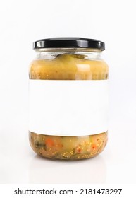 A Glass Jar With Pickled Cucumbers, Isolated. Jar Of Pickled Veggies With A Blank Label For Packaging Design, Template.