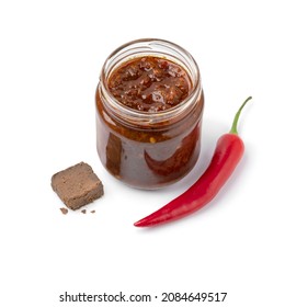 Glass jar with a variation of sambal, chili sauce, with shrimp paste isolated on white background - Powered by Shutterstock