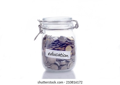Glass jars with coins and 'education' text