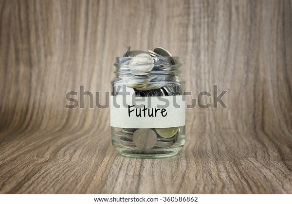 Glass jars with coins labeled Future.\
Financial Conceptual