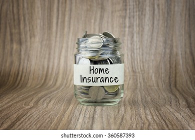 Glass Jars With Coins Labeled Home Insurance. Financial Conceptual