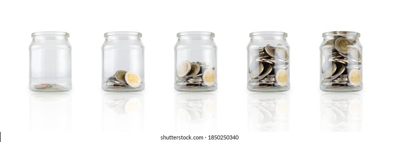 Glass jars with coins like diagram, savings concept. White isolated background - Powered by Shutterstock