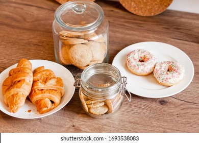 Glass Jars With Homemade Cookies. Crumbled Cookies On The Kitchen Table. Homemade Cakes, Shortbread And Biscuit Dough. Food At Home. Chocolate Cake