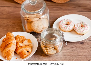 Glass Jars With Homemade Cookies. Crumbled Cookie On A Kitchen Table. Homemade Cakes, Shortbread And Biscuit Dough. Cooking, Still Life. Food At Home. Cookie With Coconut Flakes.