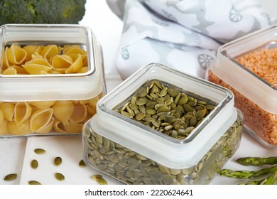 Glass Jars With Pasta, Lentils And Pumpkin Seeds. Decorated With Broccoli And Asparagus