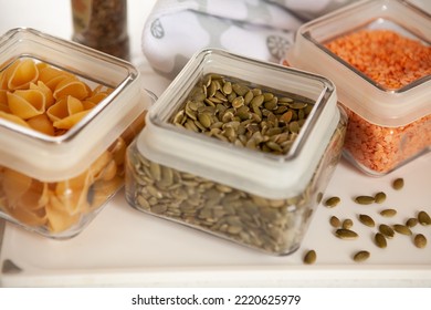 Glass Jars With Pasta, Lentils And Pumpkin Seeds. Decorated With Broccoli And Asparagus