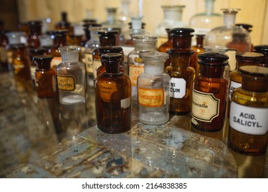 Glass jars in a pharmacy - vintage apothecary glassware for chemicals