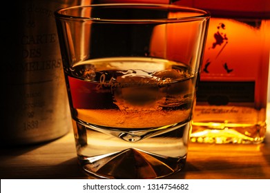 A glass of Johnnie Walker whiskey close up image.