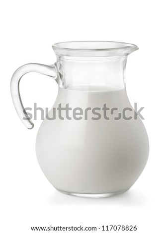 Glass jug of fresh milk isolated on white
