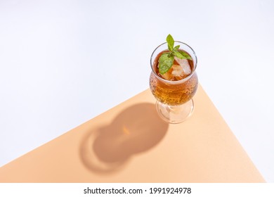 A Glass Of Kombucha Cocktail With Mint And Ice. Top View