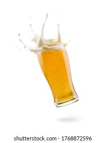 Glass Of Lager Beer Floating On White Background With Shadow