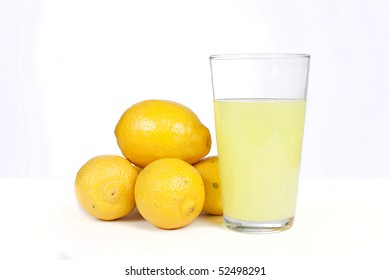 Glass Of Lemonade With Lemons