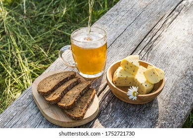 Glass Of Light Beer With Cheese And Rye Bread. Preparing Ligo Festival. Riga. Latvia