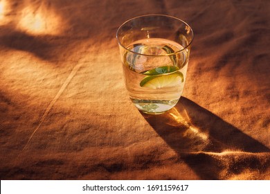 a glass of liquid on the table