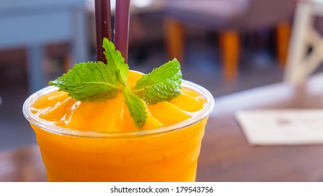 A glass of Mango Smoothie