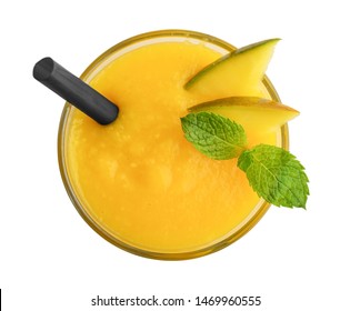 Glass of mango smoothie isolated on white background, top view. Clipping path included